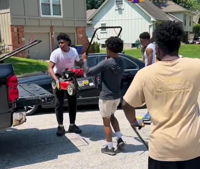 Kids outside preparing to do lawn care